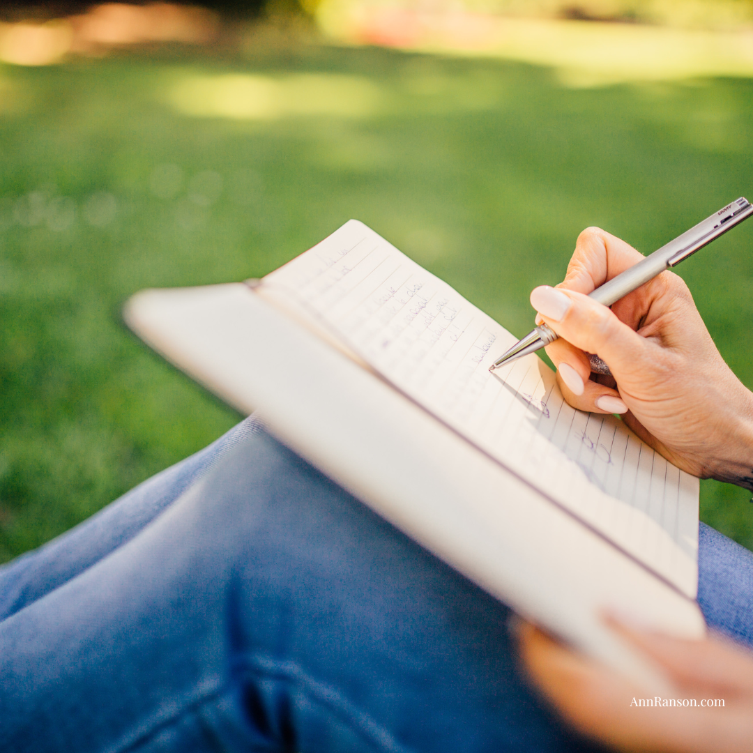 woman journal lap